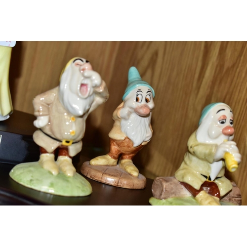 478 - ROYAL DOULTON WALT DISNEY SNOW WHITE AND THE SEVEN DWARFS FIGURES, 'Snow White' SW9, 'Doc' SW010, Gr... 