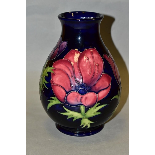 480 - A MOORCROFT POTTERY VASE, 'Anemone' pattern on blue ground, impressed backstamp and painted WM to ba... 