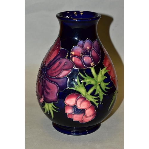 480 - A MOORCROFT POTTERY VASE, 'Anemone' pattern on blue ground, impressed backstamp and painted WM to ba... 