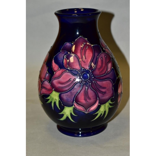 480 - A MOORCROFT POTTERY VASE, 'Anemone' pattern on blue ground, impressed backstamp and painted WM to ba... 