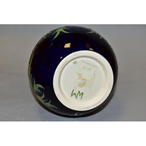 480 - A MOORCROFT POTTERY VASE, 'Anemone' pattern on blue ground, impressed backstamp and painted WM to ba... 