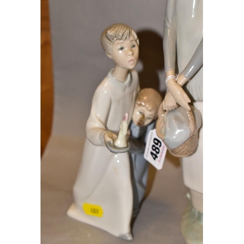 489 - THREE LLADRO FIGURES, comprising Girl with Booklet No 4501 designed by Fulgencio Garcia, height 33cm... 