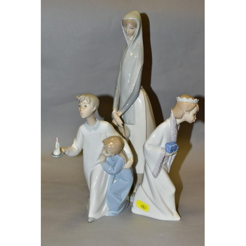 489 - THREE LLADRO FIGURES, comprising Girl with Booklet No 4501 designed by Fulgencio Garcia, height 33cm... 