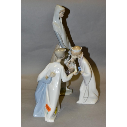 489 - THREE LLADRO FIGURES, comprising Girl with Booklet No 4501 designed by Fulgencio Garcia, height 33cm... 