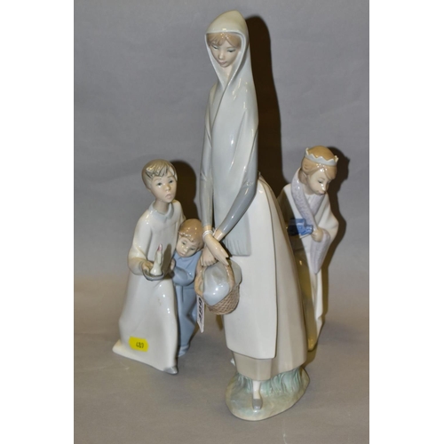 489 - THREE LLADRO FIGURES, comprising Girl with Booklet No 4501 designed by Fulgencio Garcia, height 33cm... 