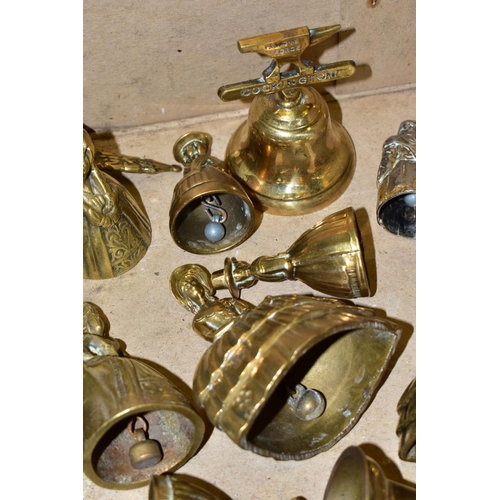 492 - A SMALL BOX OF VARIOUS BRASS BELLS, 'cockington', 'The Revenge', 'Irish Jaunting Car', Proline lady ... 