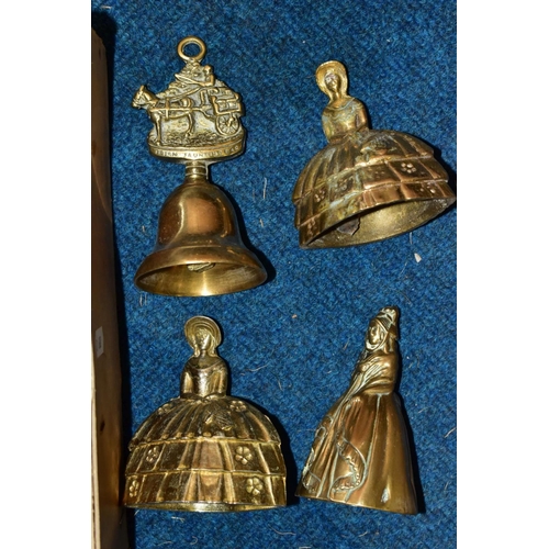 492 - A SMALL BOX OF VARIOUS BRASS BELLS, 'cockington', 'The Revenge', 'Irish Jaunting Car', Proline lady ... 