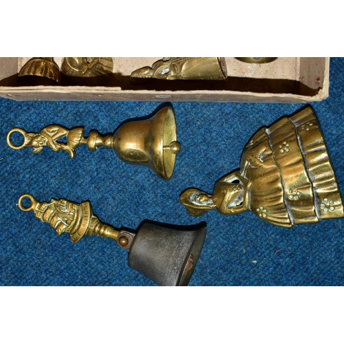 492 - A SMALL BOX OF VARIOUS BRASS BELLS, 'cockington', 'The Revenge', 'Irish Jaunting Car', Proline lady ... 