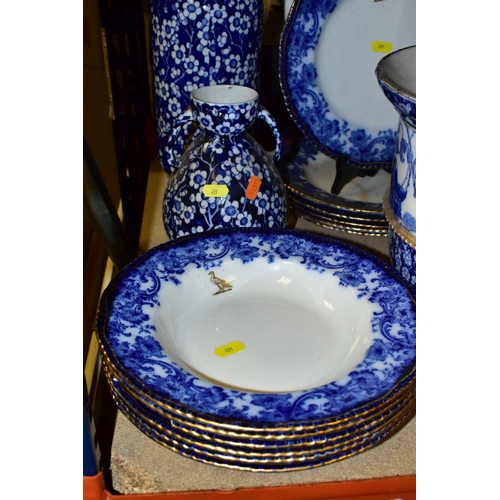 499 - ROYAL DOLTON FLOW BLUE 'MELROSE' PATTERN DINNER WARES, comprising six soup bowls (four damaged), six... 