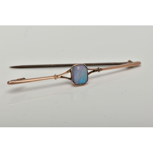 5 - A YELLOW METAL OPAL BAR BROOCH, designed with an emerald cut opal cabochon, milgrain collet mount, b... 