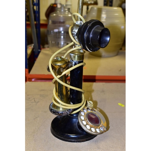 509 - A VINTAGE CANDLESTICK TELEPHONE, converted into a table lamp, height excluding shade 46cm, not teste... 