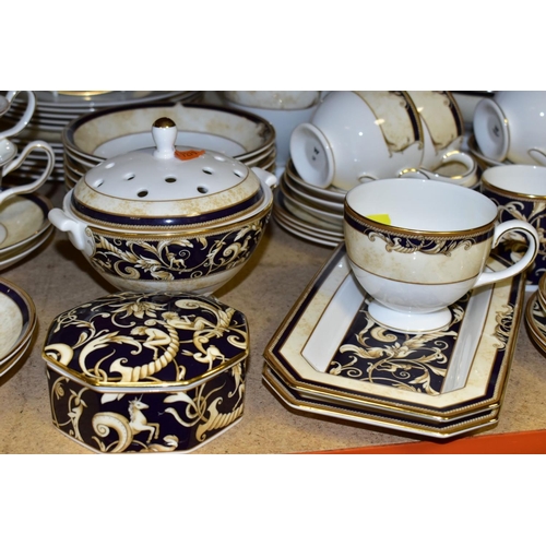 513 - A WEDGWOOD CORNUCOPIA PART DINNER SERVICE, comprising five teacups (one rings dull), seven saucers, ... 