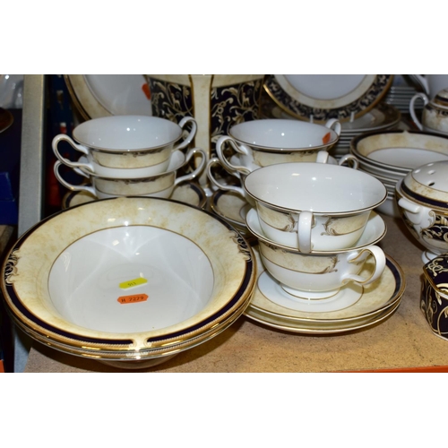 513 - A WEDGWOOD CORNUCOPIA PART DINNER SERVICE, comprising five teacups (one rings dull), seven saucers, ... 