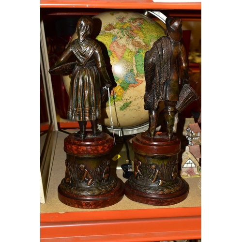 525 - A PAIR OF SPELTER FIGURES, depicting a Fisherman and woman, mounted on plinths, height in total 37cm... 