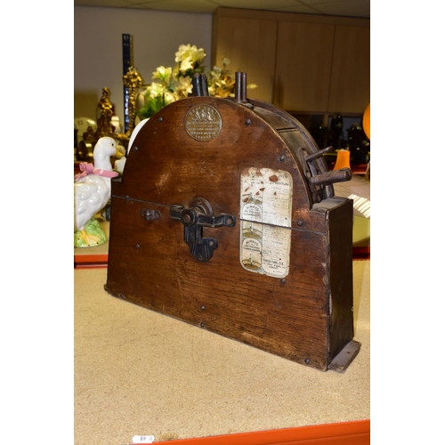 534 - A GEO & KENT KNIFE SHARPENER having (faded), original instructions still in place, width 52cm x dept... 