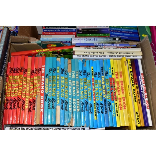 548 - BOOKS AND COMICS, a collection of over one hundred and twenty five titles in four boxes consisting o... 