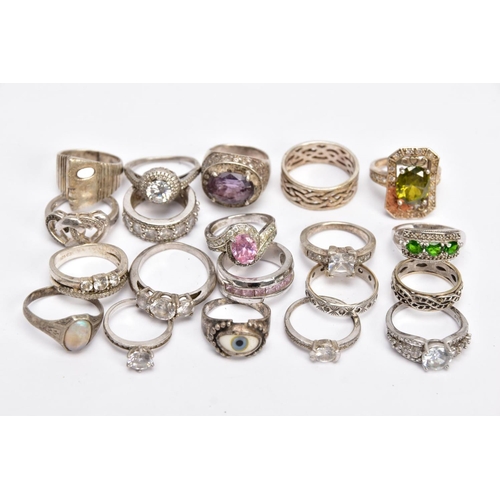 58 - A BAG OF ASSORTED RINGS, twenty white metal rings to include a silver ring designed with a central o... 