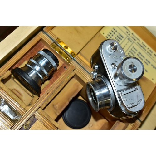 594 - A BRITISH MILITARY VERSION OF A GERMAN ROBOT JUNIOR 35MM FILM CAMERA, adapted for use in aircraft, f... 