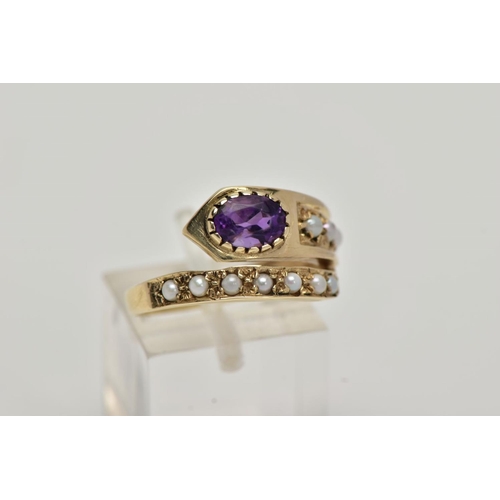 6 - A YELLOW METAL AMETHYST AND SEED PEARL RING, of a cross over design, set with a single oval cut amet... 