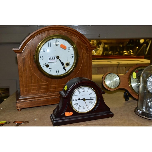 632 - A SMALL GROUP OF SEVEN CLOCKS AND A MODERN BAROMETER, the clocks include an Edwardian mahogany, oak ... 