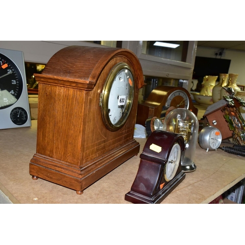 632 - A SMALL GROUP OF SEVEN CLOCKS AND A MODERN BAROMETER, the clocks include an Edwardian mahogany, oak ... 