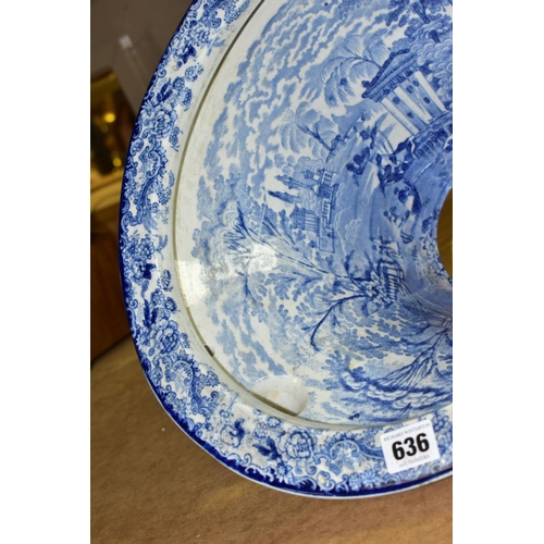 636 - A LATE VICTORIAN BLUE AND WHITE TRANSFER PRINTED POTTERY OVAL TOILET BOWL, the interior with figures... 