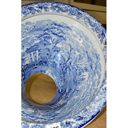 636 - A LATE VICTORIAN BLUE AND WHITE TRANSFER PRINTED POTTERY OVAL TOILET BOWL, the interior with figures... 