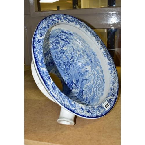 636 - A LATE VICTORIAN BLUE AND WHITE TRANSFER PRINTED POTTERY OVAL TOILET BOWL, the interior with figures... 