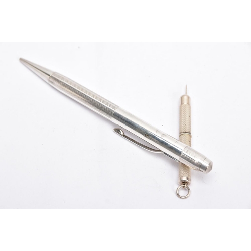 65 - A SILVER PROPELLING PENCIL AND A SILVER CIGAR PIERCER, the propelling pencil with an engine turn des... 