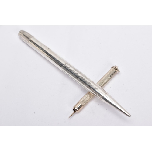 65 - A SILVER PROPELLING PENCIL AND A SILVER CIGAR PIERCER, the propelling pencil with an engine turn des... 