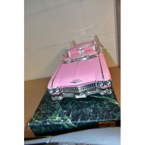 671 - A BOXED MAISTO CADILLAC ELDORADO BIARRITZ (1959), No 33202, 1/12 scale, appears complete and in very... 