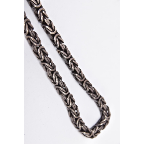 69 - A HEAVY WHITE METAL BYZANTINE CHAIN, fitted with a lobster claw clasp, length 560mm, approximate gro... 