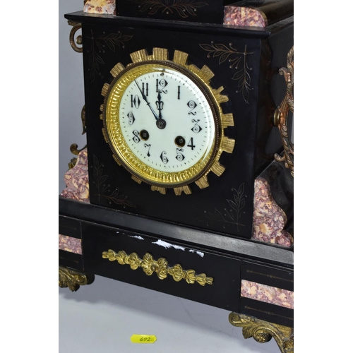 692 - A LATE 19TH CENTURY BLACK SLATE, MARBLE AND GILT METAL CLOCK GARNITURE, the clock with urn shaped su... 