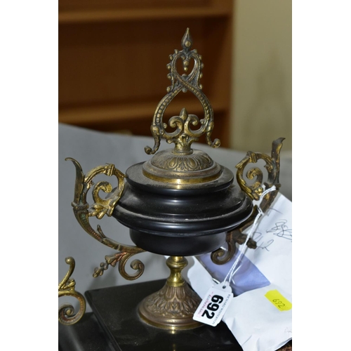 692 - A LATE 19TH CENTURY BLACK SLATE, MARBLE AND GILT METAL CLOCK GARNITURE, the clock with urn shaped su... 