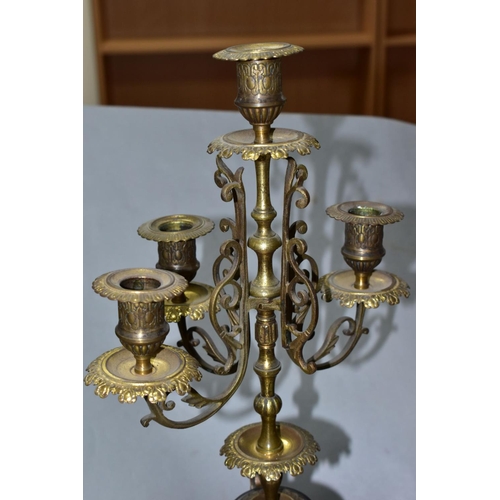 692 - A LATE 19TH CENTURY BLACK SLATE, MARBLE AND GILT METAL CLOCK GARNITURE, the clock with urn shaped su... 