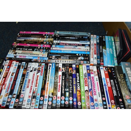 697 - NINE BOXES OF DVD'S, ETC, to include films - Hellboy, Safe House, Hitch, Kings Speech, Black Hawk Do... 