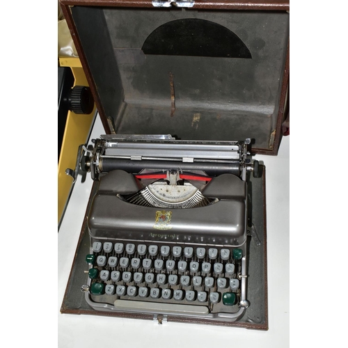 698 - A CASED IMPERIAL GOOD COMPANION 3 PORTABLE TYPEWRITER, with a Bar-Lock desk typewriter and a Brother... 