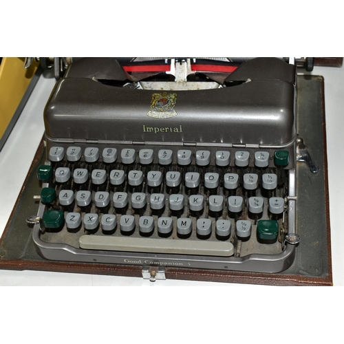 698 - A CASED IMPERIAL GOOD COMPANION 3 PORTABLE TYPEWRITER, with a Bar-Lock desk typewriter and a Brother... 