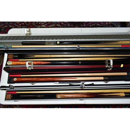 702 - A QUANTITY OF WOODEN CUES BY TONY GLOVER/GLOVER CUES, all are two piece cues some with extension pie... 