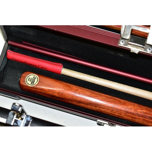 702 - A QUANTITY OF WOODEN CUES BY TONY GLOVER/GLOVER CUES, all are two piece cues some with extension pie... 