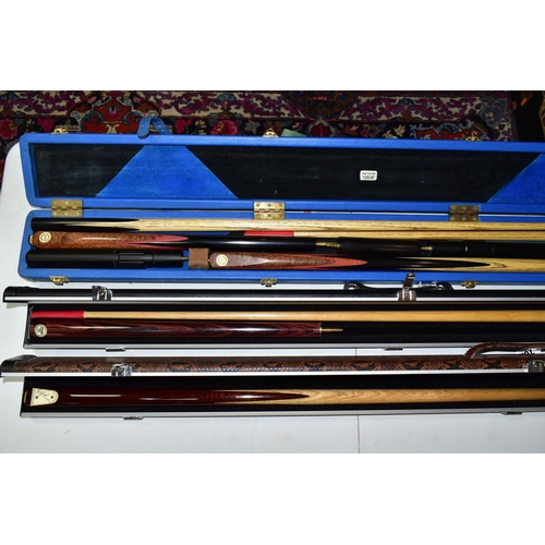 702 - A QUANTITY OF WOODEN CUES BY TONY GLOVER/GLOVER CUES, all are two piece cues some with extension pie... 