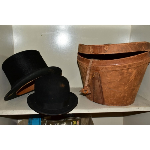 746 - A LEATHER TOP HAT BOX (dent to side), containing a Tress & Co London top hat, 8 x 6¼ - signs of wear... 