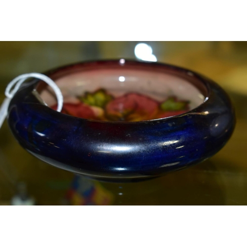 772 - A MOORCROFT POTTERY FLAMBE LIPPED BOWL, Hibiscus pattern, impressed backstamp, diameter inside lip 1... 