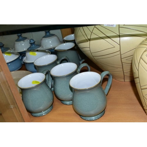 783 - A GROUP OF DENBY POTTERY, to include two Origins pattern vases, designed by Richard Eaton, heights 2... 