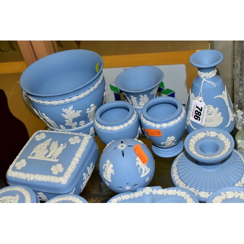 786 - A GROUP OF WEDGWOOD PALE BLUE JASPERWARE, including a small planter (11cm high), a pair of trinket b... 