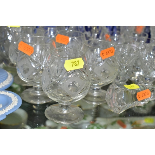 787 - A GROUP OF CLEAR AND COLOURED GLASS WARE, including un-named suites of six cut glass glasses, brandy... 