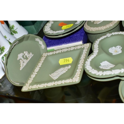 794 - A GROUP OF GREEN WEDGWOOD JASPERWARE, including vases, trinket pots and covers, trinket dishes, a cu... 