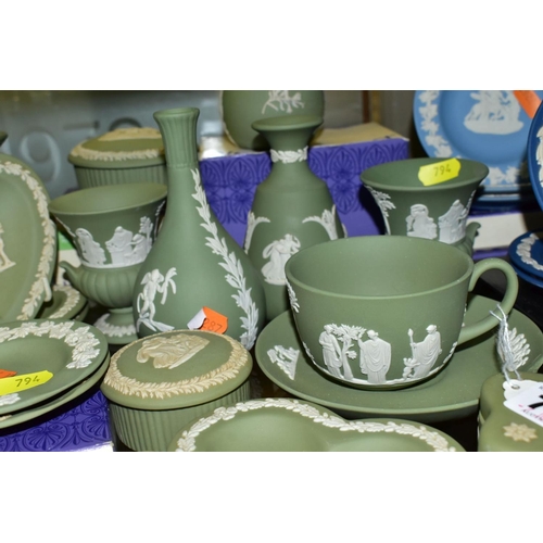 794 - A GROUP OF GREEN WEDGWOOD JASPERWARE, including vases, trinket pots and covers, trinket dishes, a cu... 