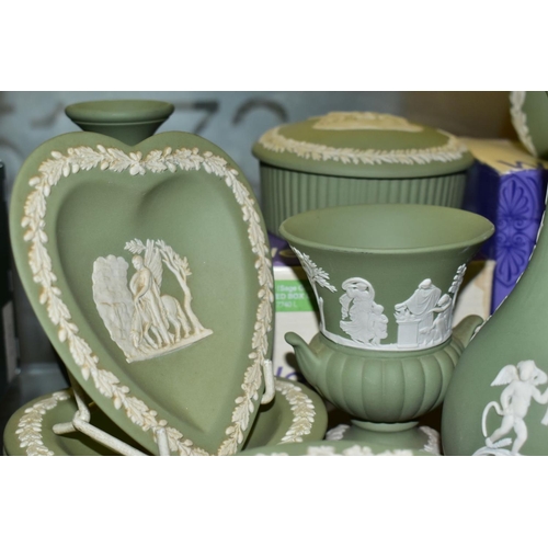 794 - A GROUP OF GREEN WEDGWOOD JASPERWARE, including vases, trinket pots and covers, trinket dishes, a cu... 