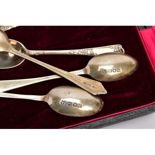 85 - A CASED SET OF EARLY 20TH CENTURY SILVER TEASPOONS AND CASED SET OF SIX TEASPOONS, each with a flora... 